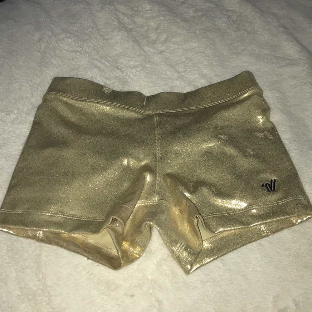 VARSITY SPIRIT short gold shorts
